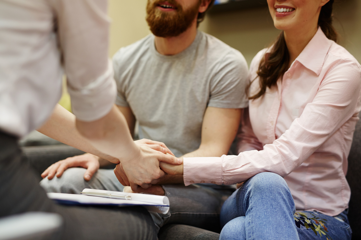 A couple meeting with a fertilty counselor