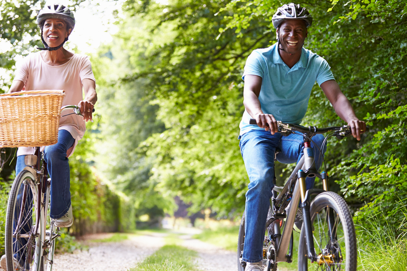 A couple biking in the wilderness