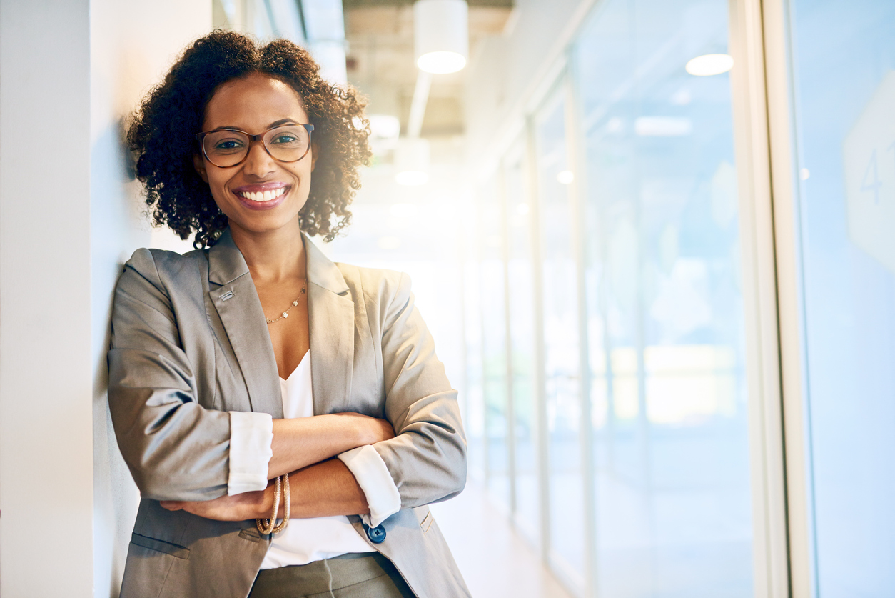 A female African American wearing business clothing