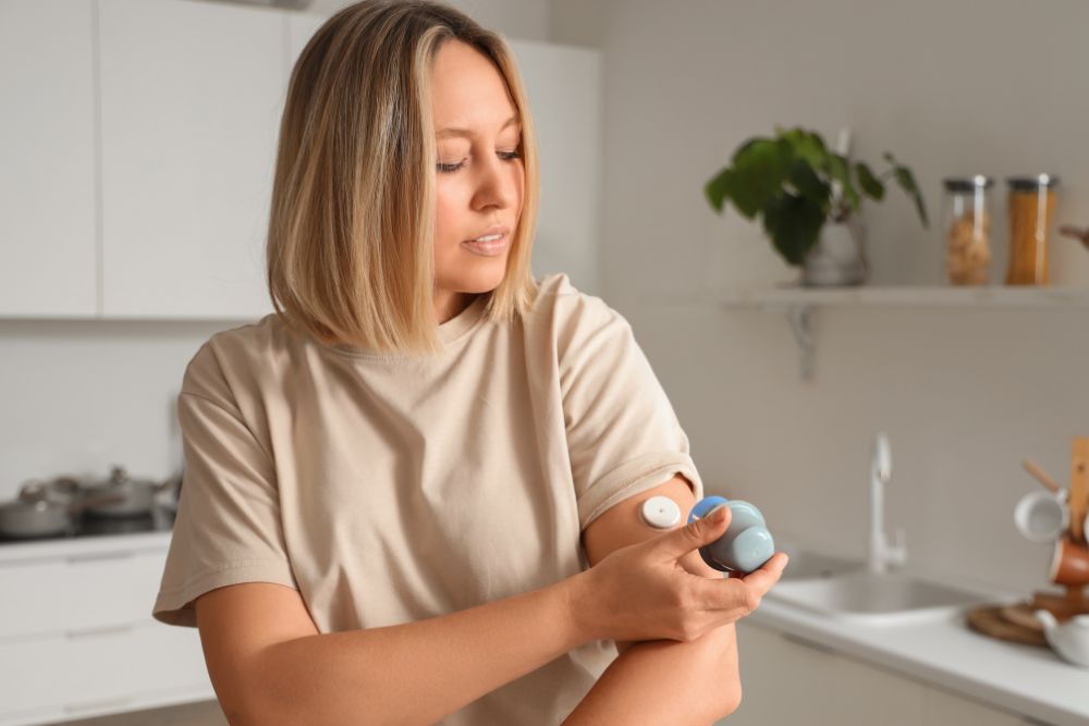 Female taking a blood sugar test