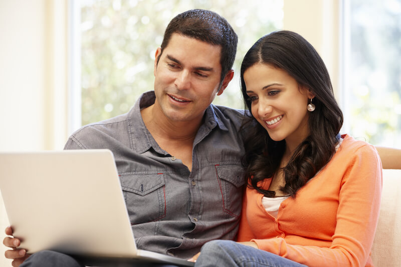 A couple looking at cost effective fertility treatments