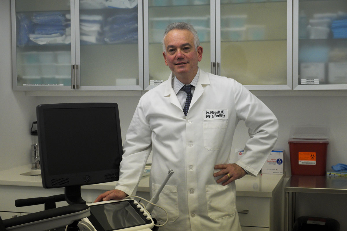 Dr. Paul Gindoff, fertility specialists at Chelsea Fertility New York City, stands inside a lab