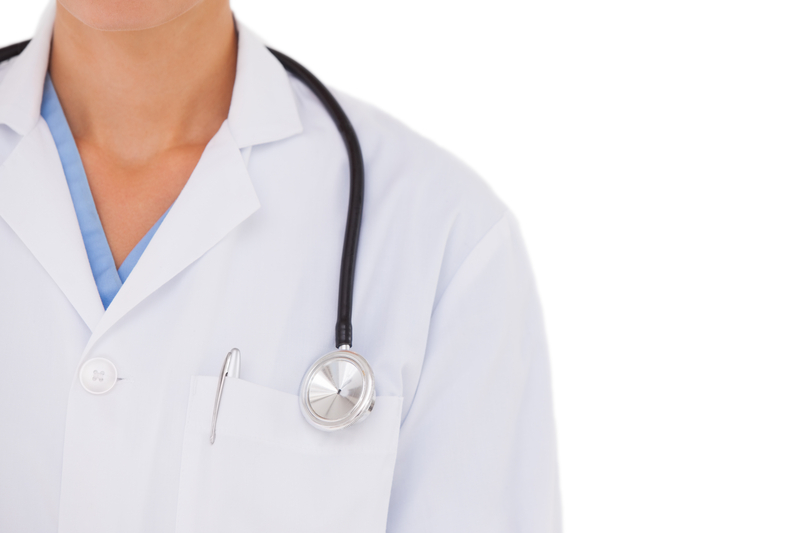 A female doctor with a stethoscope around her neck