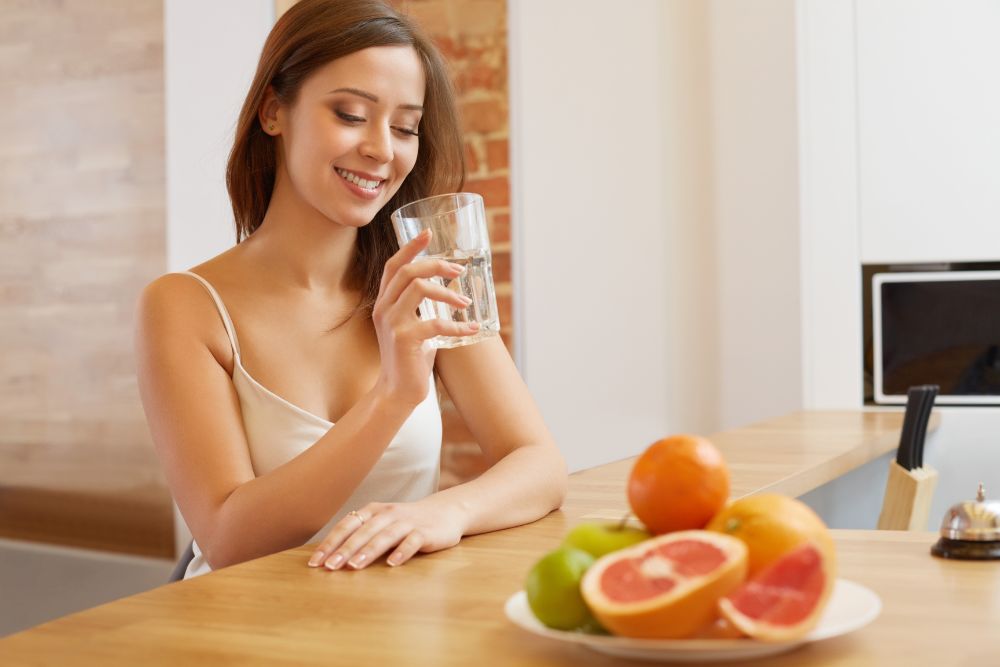 Female holding a glass