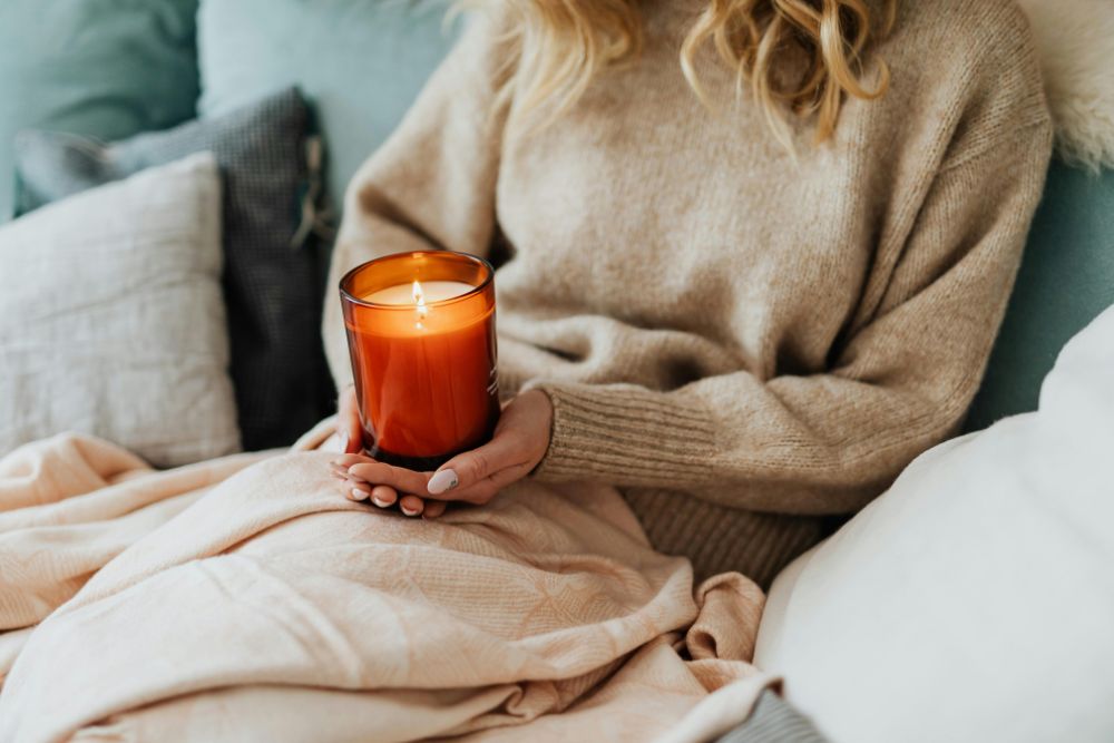 Female holding a candle