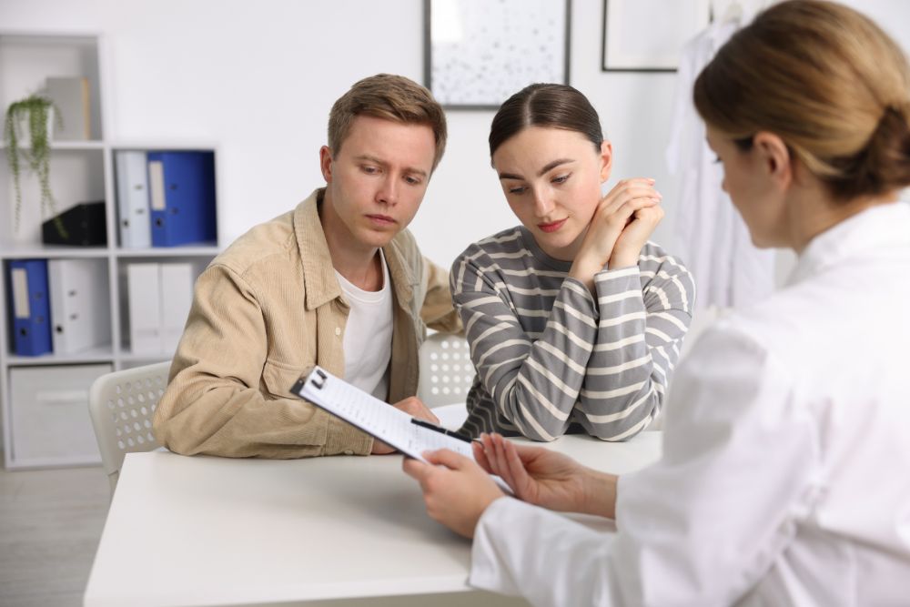 Couple consulting with a fertility specialist